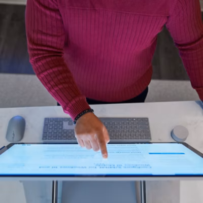 A hand on a keyboard.