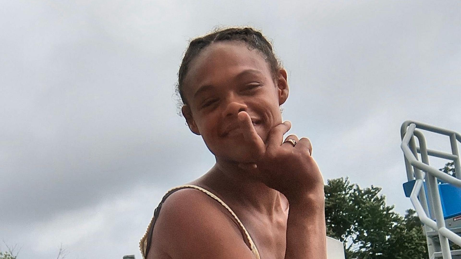 Tasia Fortune, 29, poses for a photo during a family reunion in Kentucky
