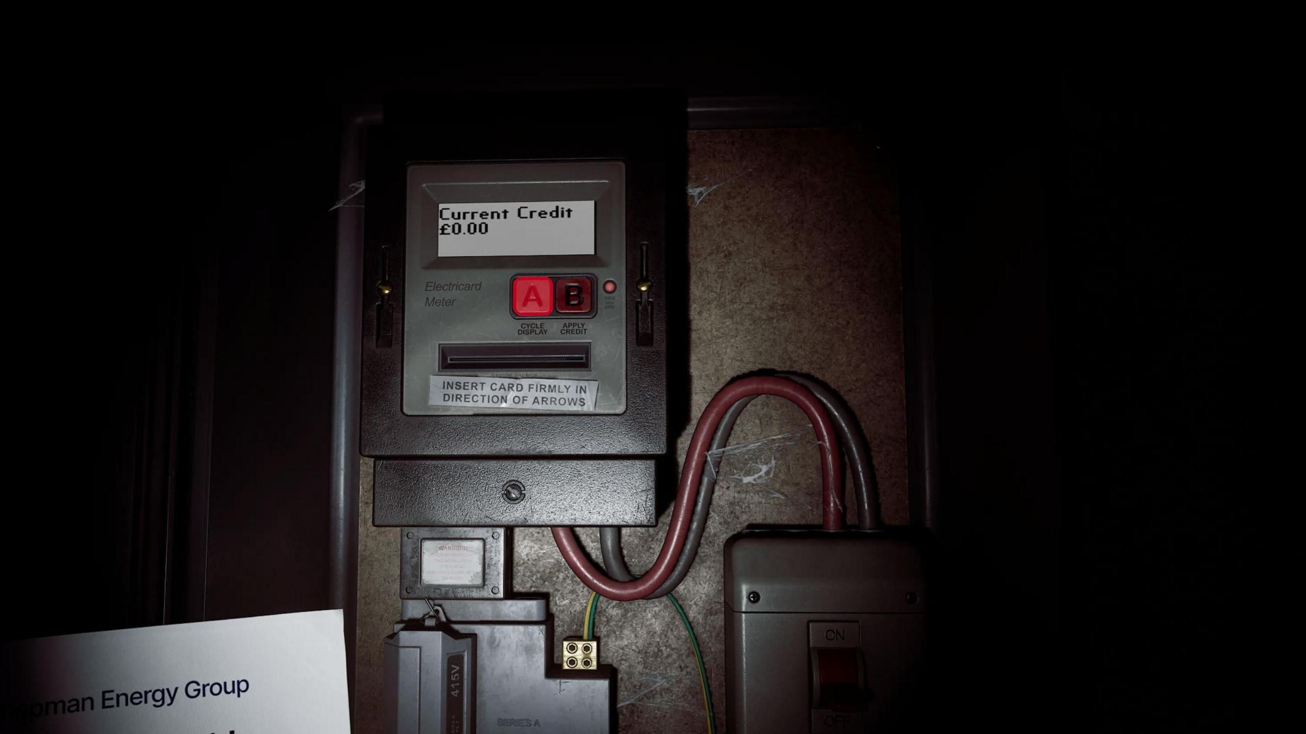 An in-game screenshot showing an electricity metre - it says "Current Credit £0.00".