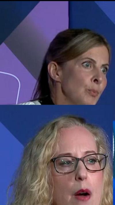 Two woman in split screen. Bottom woman has blonde curly hair and black rimmed glasses. Top woman has her hair tied back.