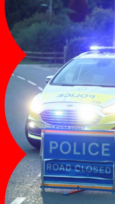A police car blocks a road near the RAF Fairford airbase