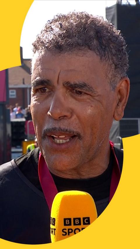 Chris Kamara talking to the BBC