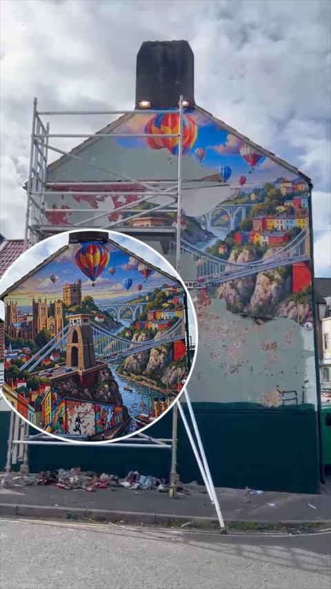 Old mural in the background thats been ripped down. Circle insert in front showing the mural before.