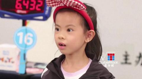 Six-year-old Chinese girl looking surprised