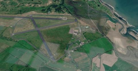 The Former Llanbedr Airfield Site, fields and the river are visible.