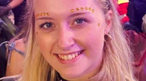 Meg smiling