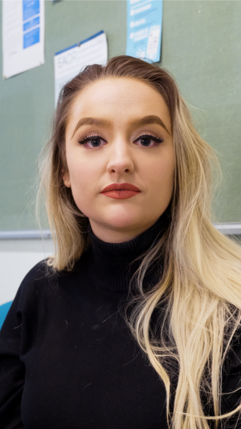 Presenter Ellie Colton looking at the camera 
