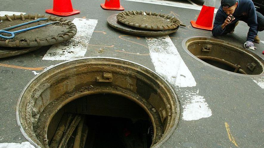 An official inspects manhole covers near Empire State Building (File picture)