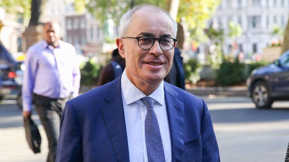 Lord Patrick Pannick QC walking down the street