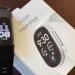Fitbit Charge 6 next to an unopened Fitbit Edge