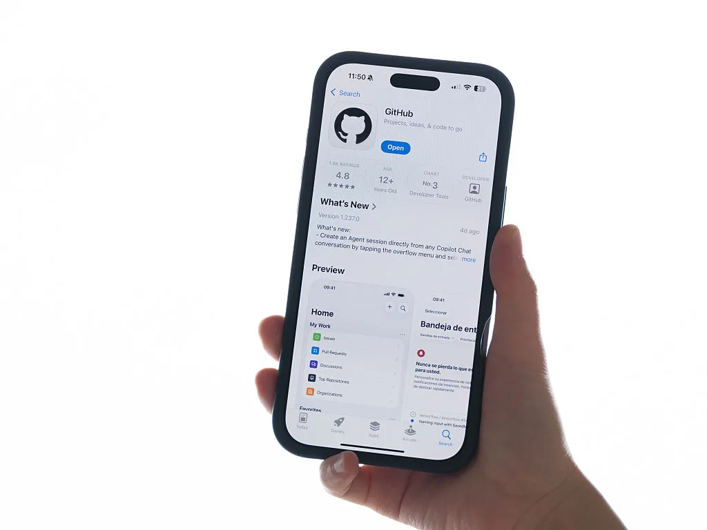 In this photo illustration, the GitHub app is opened on a phone on December 7, 2025 in Sydney, Australia. The Online Safety Amendment (Social Media Minimum Age) Act 2024 requires social media platforms, including TikTok, Instagram, Facebook, YouTube, Snapchat, X, Reddit, Threads, Twitch, and Kick to implement age-verification systems and take reasonable steps to prevent account creation by users under 16, with non-compliant platforms facing penalties of up to A$50 million. 