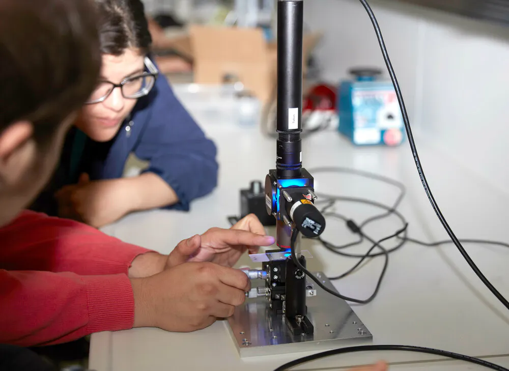 person using scientific machinery