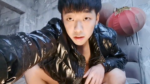Adorable young Chinese guy enjoys a private session in a public hotel