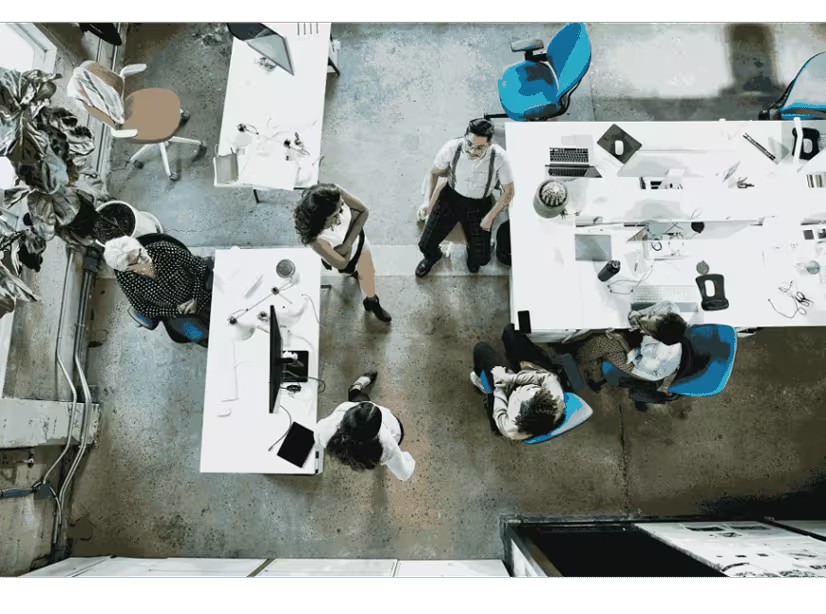 coworkers in an office as seen from above