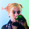 nightmare: clementine from the movie 'eternal sunshine' drinking a beer (clementine)