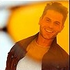 suzy_queue: A photo of Lou Ferrigno Jr through the golden lenses of sunglasses (9-1-1: Sunny Lou)