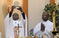 Vision 2026 Feister 1 Religious communities embrace diverse members Father Richard Toboso, G.H.M. elevates the host as Father Charles Aketch, G.H.M. assists.